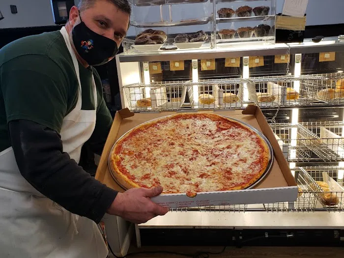 Mannys Pizzeria inc. 4