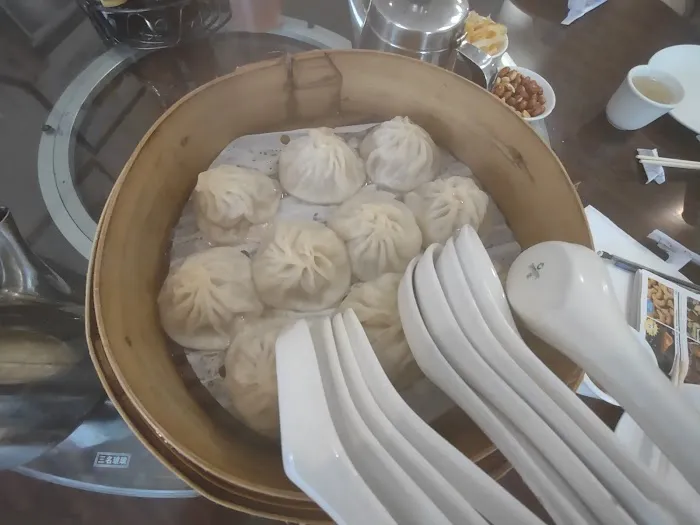 CHINA NORTH DUMPLING INC 7