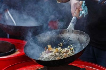 The History of the Wok: An Essential Tool in Chinese Cooking