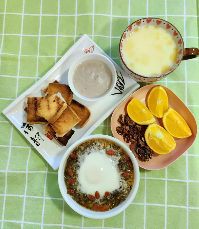 Today's breakfast: steamed eggs with seaweed and meat foam, egg tea, toast with taro puree, fruit and nut platter