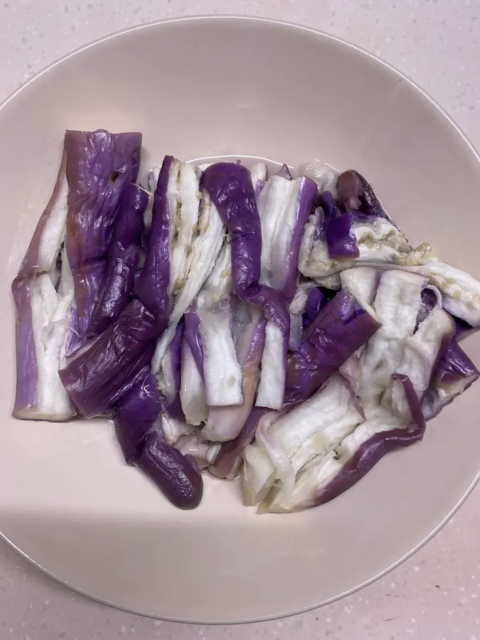 Eggplant with chili peppers and preserved eggs in the rice step 0