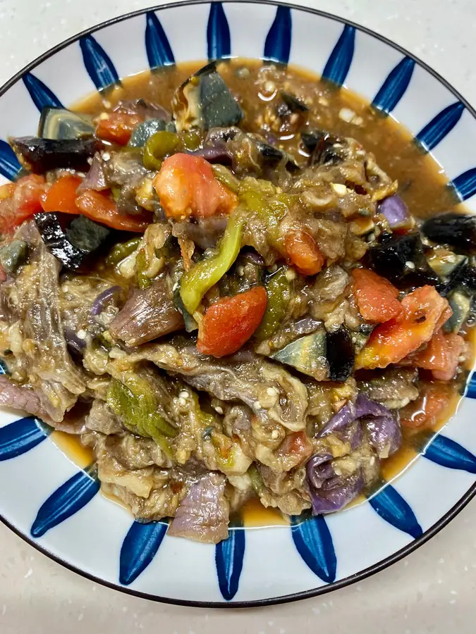 Eggplant with chili peppers and preserved eggs in the rice