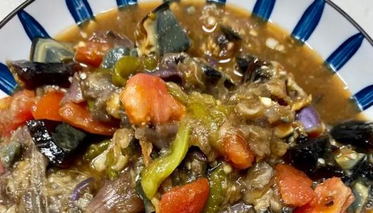 Eggplant with chili peppers and preserved eggs in the rice