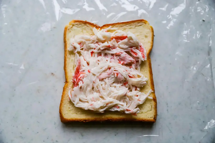 Crab salad, eggs, avocado sandwiches step 0