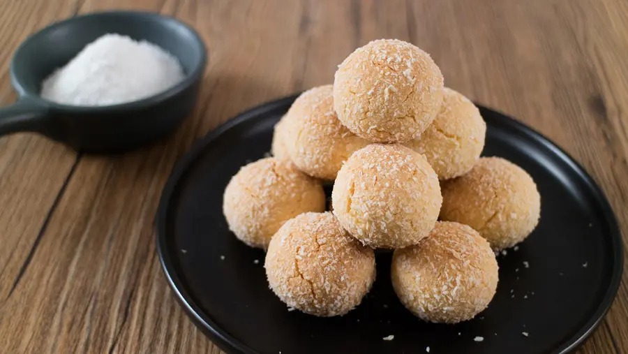 Golden desiccated coconut balls with a rich coconut aroma