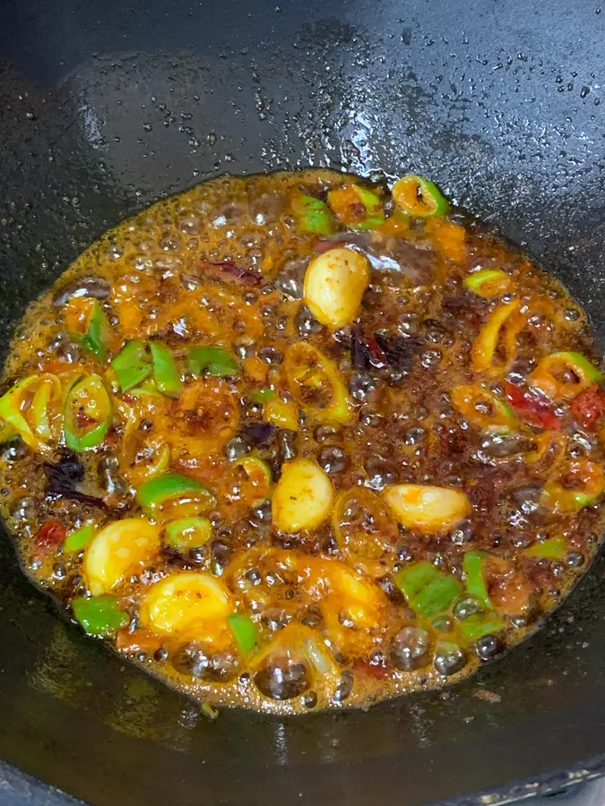 Spicy shrimp  with chicken wings in a dry pot step 0