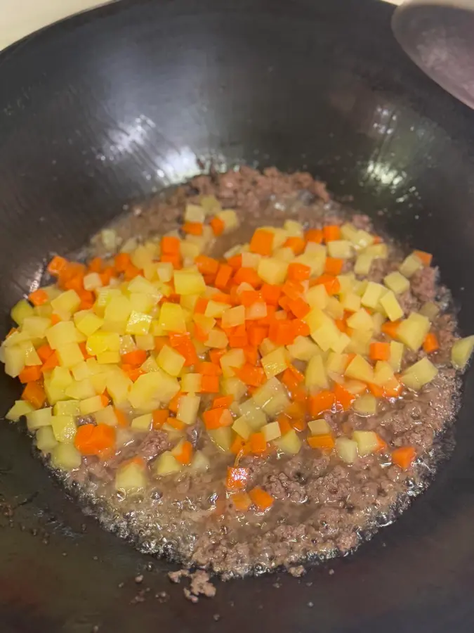 Children's favorite fast dish - curry potatoes, carrots, beef cubes step 0