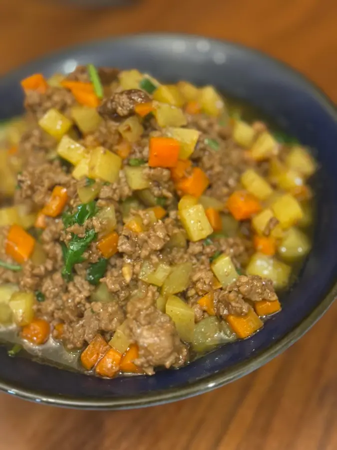 Children's favorite fast dish - curry potatoes, carrots, beef cubes step 0