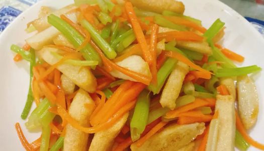 Stir-fried fish and tofu with celery and carrot shreds