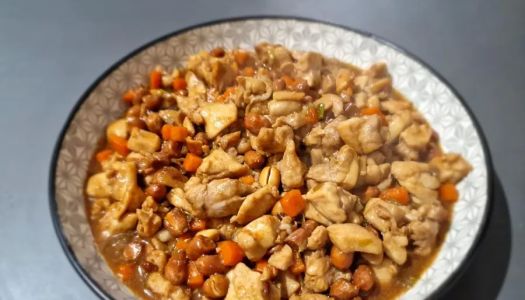 Diced chicken in a pot pot