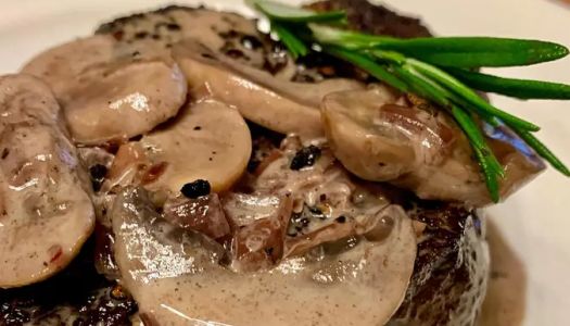 filet mignon service with red wine mushroom cream sauce