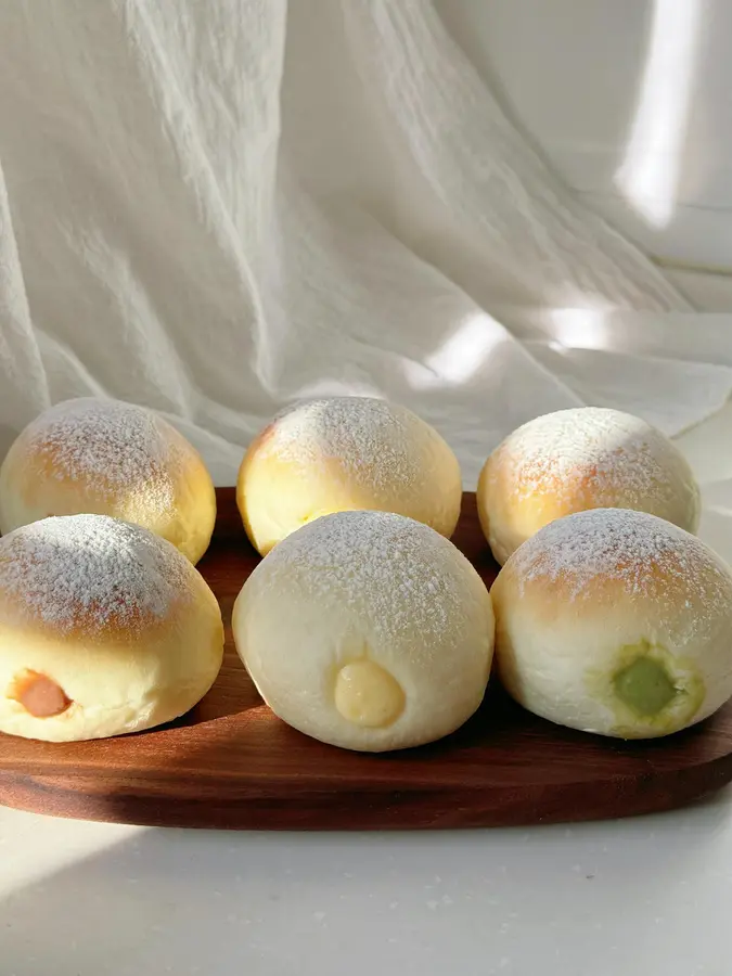 | A bite of popping Japanese iced bread (custard sauce version)