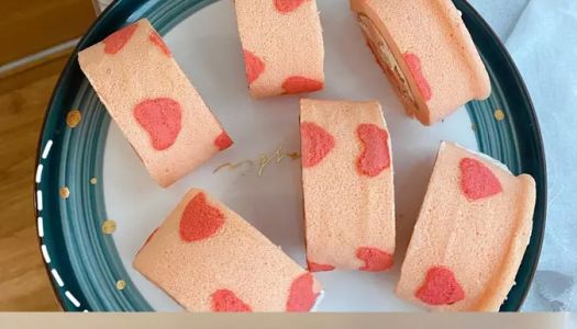 Make a (love strawberry cake roll ) for a loved one on Valentine's Day , full of  you