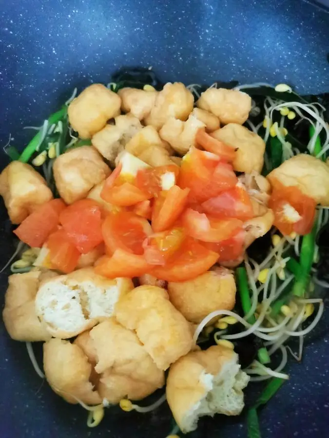 A wonderful combination of fried tofu and soybean sprouts step 0