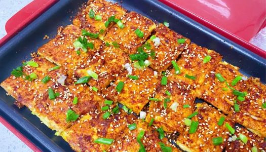 A pan version of the sizzling crispy tofu, racing past the roadside stalls