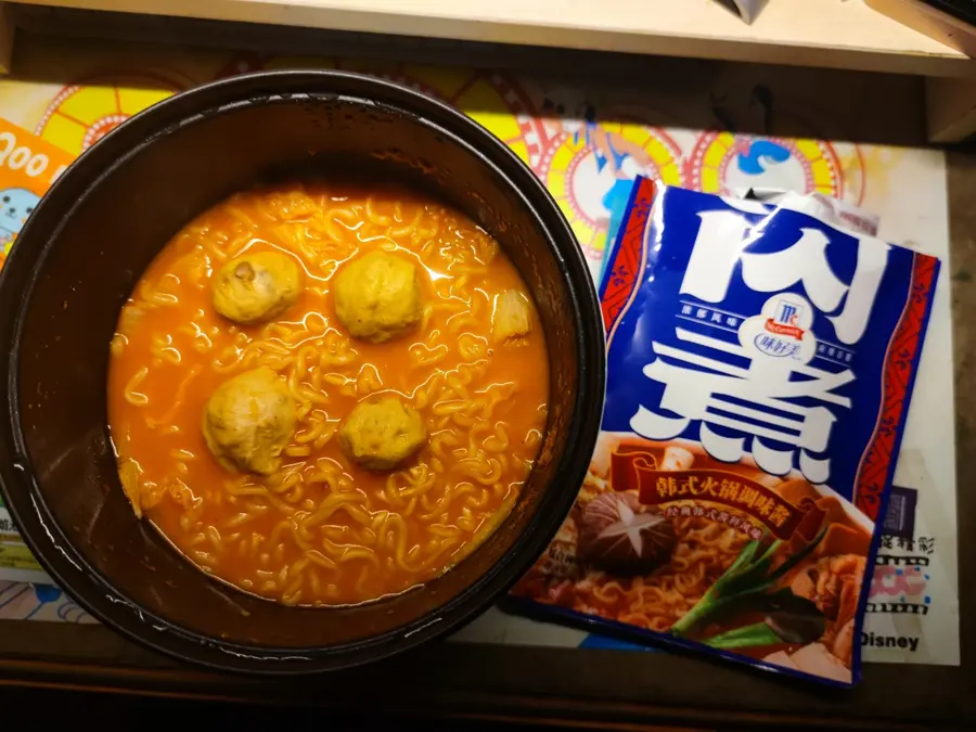 One person eats supper Korean spicy cabbage-flavored instant noodles