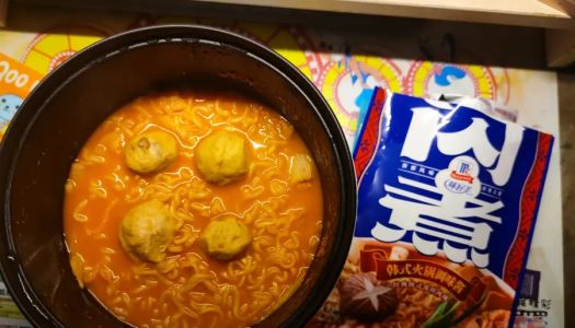 One person eats supper Korean spicy cabbage-flavored instant noodles