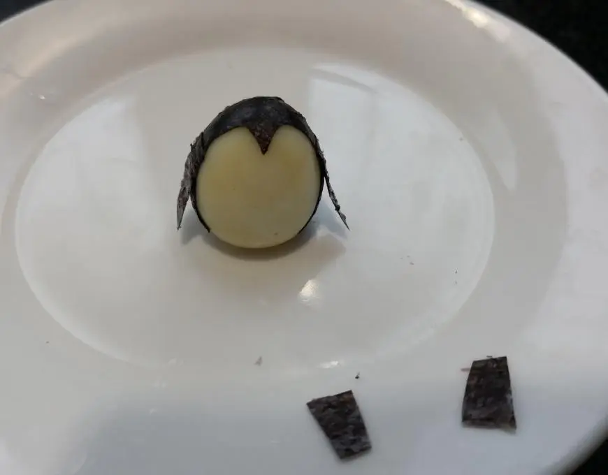 Creative meal for children: cartoon penguin quail eggs step 0