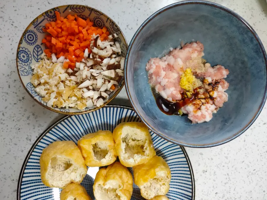 As soon as it is served on the table, it is stuffed with fried tofu with seasonal vegetables and meat foam step 0