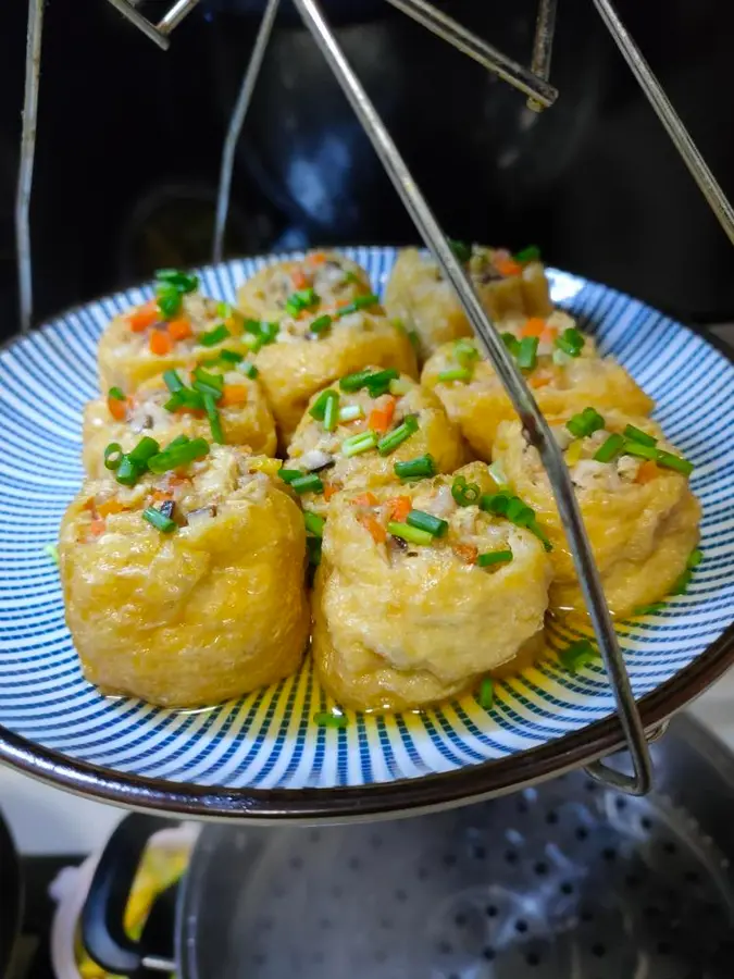 As soon as it is served on the table, it is stuffed with fried tofu with seasonal vegetables and meat foam step 0