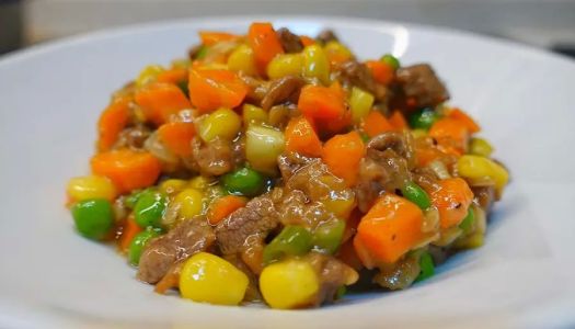 Stir-fried beef cubes with green onion and vegetables that children love