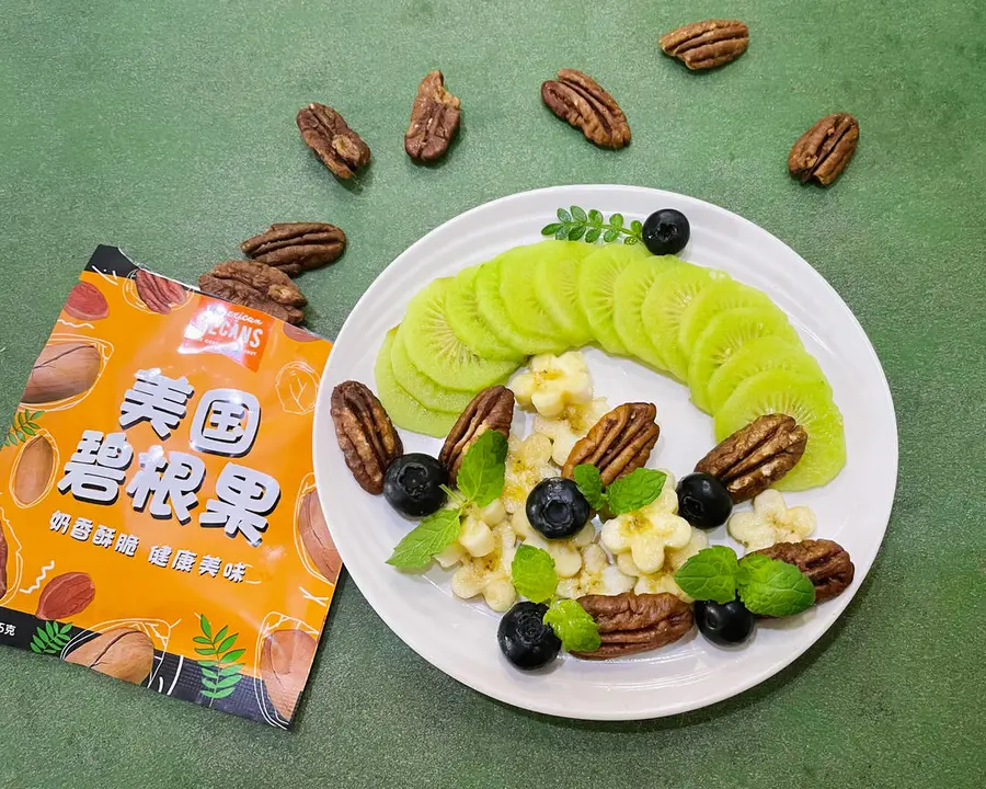 A creative platter of pecans and fruits step 0