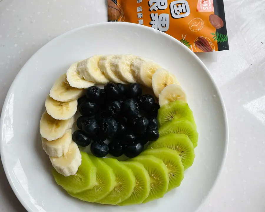 A creative platter of pecans and fruits step 0