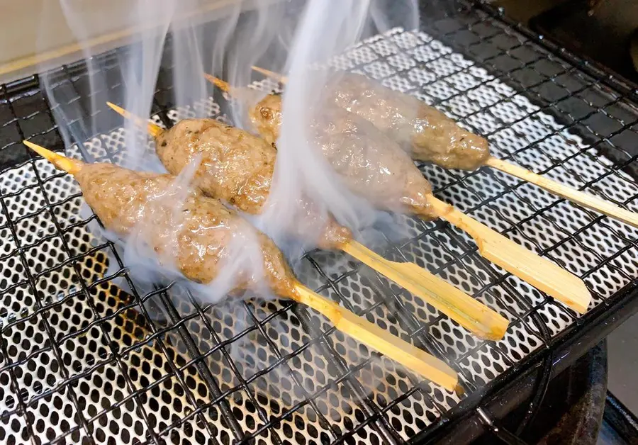 Grilled beef balls skewers at a late-night cafeteria step 0