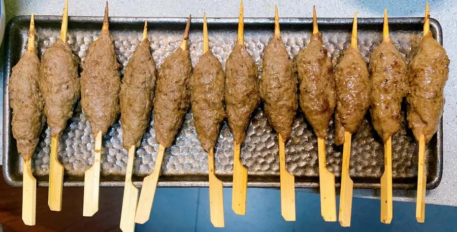 Grilled beef balls skewers at a late-night cafeteria step 0