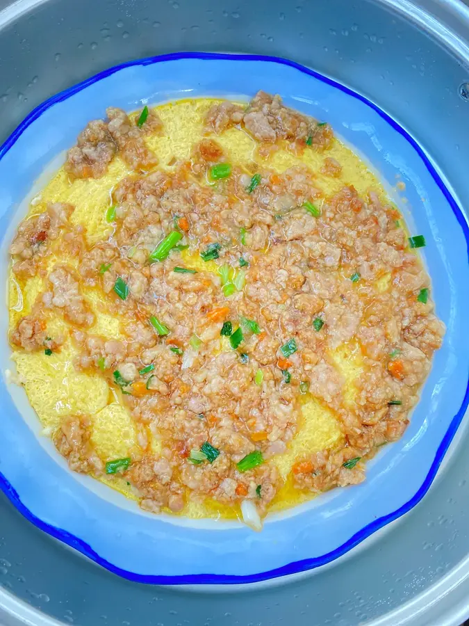 Steamed eggs with tofu and meat foam