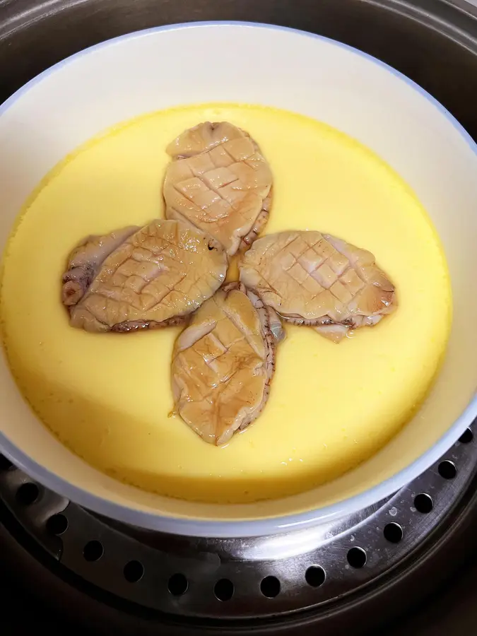 Nutritious and tender steamed egg custard with abalone step 0