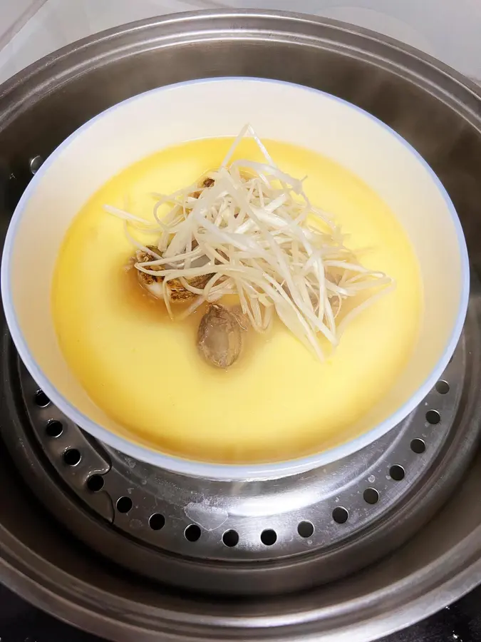 Nutritious and tender steamed egg custard with abalone step 0