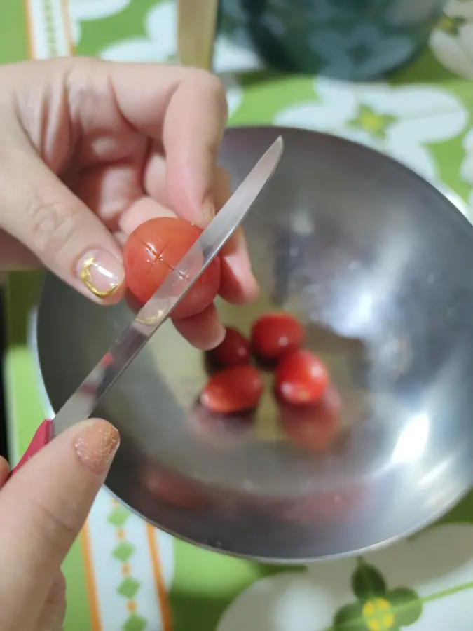 A small fresh plum and tomato in the Chinese New Year's Eve dinner step 0