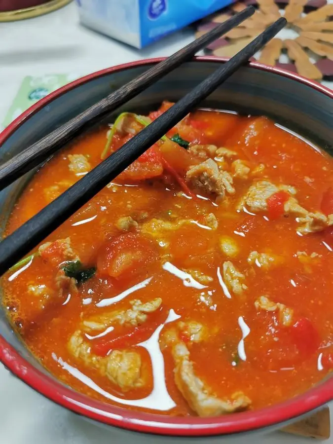 Tomato stewed tenderloin is sweet and sour appetizing to cool off step 0