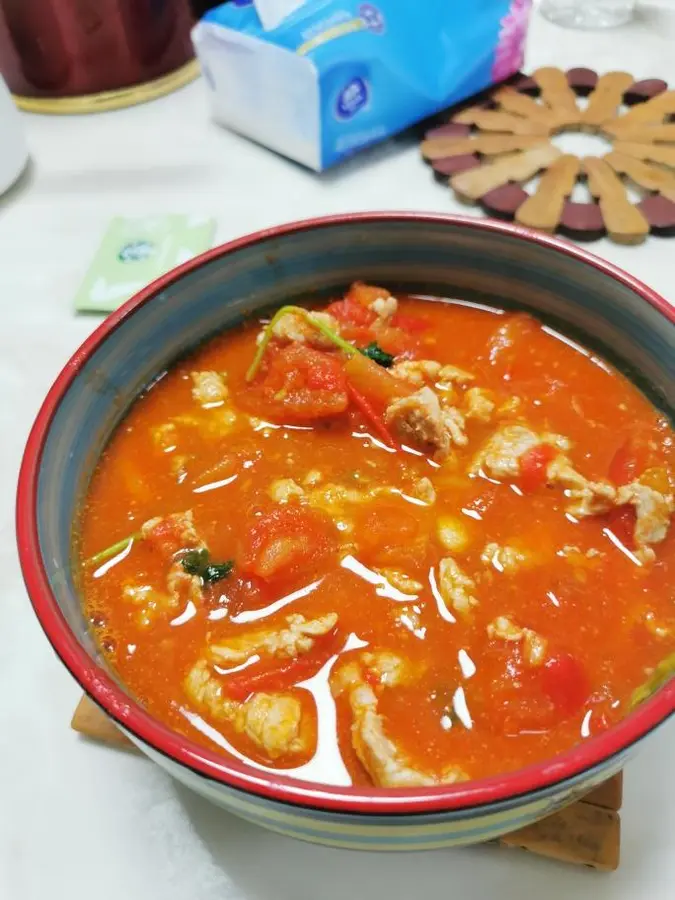 Tomato stewed tenderloin is sweet and sour appetizing to cool off